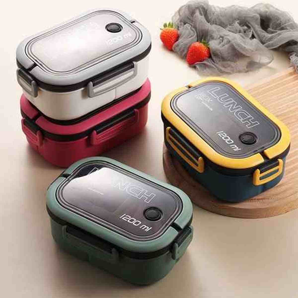 Ensemble de lunch boxes éco-étanches de 1200 ml disponibles en plusieurs couleurs : blanc, rose, jaune et vert, empilées élégamment.